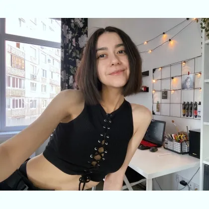 Яскрава, жива, спра вжня кокетка.